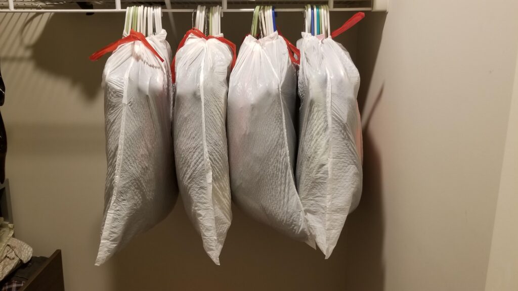 how to move clothes on hangers